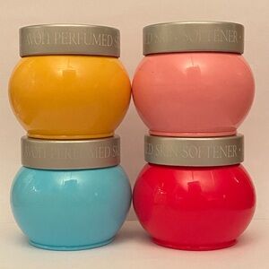 4 Avon skin softeners: Honeysuckle - Hawaiian White Ginger - Persian Wood - Rose